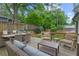 Spacious outdoor deck with ample seating and dining areas, perfect for entertaining at 480 Wimbledon Ne Rd, Atlanta, GA 30324