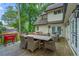 Cozy back deck with dining and lounge areas, offering a great outdoor living space at 480 Wimbledon Ne Rd, Atlanta, GA 30324