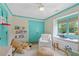 Charming bedroom featuring fun decor, window seat, and painted trim at 480 Wimbledon Ne Rd, Atlanta, GA 30324