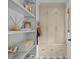 Mudroom showcasing custom storage shelves, lockers, and bench seating with a window at 480 Wimbledon Ne Rd, Atlanta, GA 30324