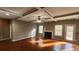 Inviting living room with hardwood floors, a fireplace, a coffered ceiling, and ample natural light at 488 Morris Rd, Hiram, GA 30141