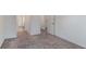 A neutral carpeted bedroom with white walls and white doors at 939 Brittfield Way, Loganville, GA 30052