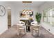 Chic dining room featuring modern lighting and elegant decor at 939 Brittfield Way, Loganville, GA 30052