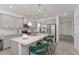 Contemporary kitchen with gray cabinets, stainless steel appliances, and a large island at 939 Brittfield Way, Loganville, GA 30052