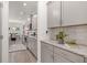 Well-equipped kitchen with granite countertops and stainless steel appliances at 939 Brittfield Way, Loganville, GA 30052
