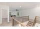 Spacious living room featuring a ceiling fan, staircase, and comfortable seating at 939 Brittfield Way, Loganville, GA 30052