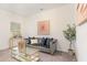 Bright living room with luxury furniture and decor at 939 Brittfield Way, Loganville, GA 30052
