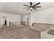 Spacious loft with comfortable seating, neutral decor, and plenty of natural light at 939 Brittfield Way, Loganville, GA 30052