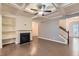 Spacious living room with coffered ceilings, hardwood floors, and a fireplace at 3192 Spicy Cedar Lane Ln, Stonecrest, GA 30038