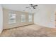 Large main bedroom features a vaulted ceiling and a ceiling fan at 3192 Spicy Cedar Lane Ln, Stonecrest, GA 30038