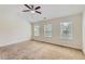 Bright main bedroom features a vaulted ceiling and multiple windows at 3192 Spicy Cedar Lane Ln, Stonecrest, GA 30038
