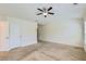 Main bedroom features a ceiling fan and multiple closets at 3192 Spicy Cedar Lane Ln, Stonecrest, GA 30038