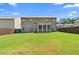 The home has a screened porch and a spacious backyard with a wooden fence. Great for relaxing outdoors at 850 Ethereow Ct, Lawrenceville, GA 30046