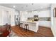 Kitchen with stainless appliances, granite countertops, and a center island with seating at 850 Ethereow Ct, Lawrenceville, GA 30046
