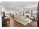 Spacious living room with an open layout, modern fireplace, and comfortable seating for entertaining guests at 850 Ethereow Ct, Lawrenceville, GA 30046