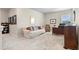 Living room featuring carpet and paint, a window, couch, desk, and cabinet at 850 Ethereow Ct, Lawrenceville, GA 30046
