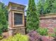 A beautiful brick entrance to Walton Creek Estates is surrounded by lush landscaping at 913 Sunny Meadows Ln, Marietta, GA 30062