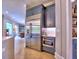 Modern kitchen with stainless steel refrigerator, microwave and cabinets at 913 Sunny Meadows Ln, Marietta, GA 30062