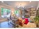 Elegant living room with fireplace, built-in shelves and ample natural light at 913 Sunny Meadows Ln, Marietta, GA 30062