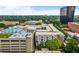 Aerial view of condos and apartment buildings with a pool in the center at 120 Ralph Mcgill Ne Blvd # 1409, Atlanta, GA 30308