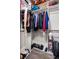 Organized closet with hanging clothes, shoes, and storage containers at 120 Ralph Mcgill Ne Blvd # 1409, Atlanta, GA 30308