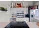 Modern kitchen featuring stainless steel appliances, white cabinets, and quartz countertops at 120 Ralph Mcgill Ne Blvd # 1409, Atlanta, GA 30308