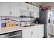 Modern kitchen featuring stainless steel appliances, white cabinets, and quartz countertops at 120 Ralph Mcgill Ne Blvd # 1409, Atlanta, GA 30308