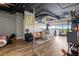 Open living room features hardwood floors, neutral walls, and an abundance of natural light from the windows at 120 Ralph Mcgill Ne Blvd # 1409, Atlanta, GA 30308