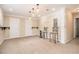 Finished basement space with two chairs and a support column at 317 Saint Pauls Ct, Stockbridge, GA 30281