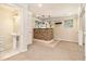 Finished basement with a stone bar and adjacent bathroom at 317 Saint Pauls Ct, Stockbridge, GA 30281