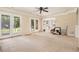 Spacious finished basement with double doors leading to the backyard at 317 Saint Pauls Ct, Stockbridge, GA 30281