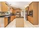 Well-appointed kitchen with granite countertops, stainless steel appliances, and a center island at 317 Saint Pauls Ct, Stockbridge, GA 30281