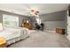 Large bedroom featuring a ceiling fan, large windows, and a desk area at 4300 May Apple Dr, Alpharetta, GA 30005