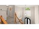 Elegant foyer with staircase and front entry view at 4300 May Apple Dr, Alpharetta, GA 30005