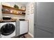 Well-organized laundry room with modern washer and dryer at 4300 May Apple Dr, Alpharetta, GA 30005