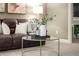 Cozy living room detail with decorative accents, wine, and comfortable seating at 4300 May Apple Dr, Alpharetta, GA 30005