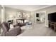 Inviting living room featuring plush seating, stylish decor, and an open layout at 4300 May Apple Dr, Alpharetta, GA 30005