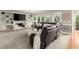 Bright and open living room area featuring built-in storage and entertainment center at 4300 May Apple Dr, Alpharetta, GA 30005