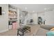 A finished basement area with a staircase, built-in shelving and a desk at 5242 Mccarter Sta, Stone Mountain, GA 30088