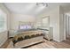 Well-lit bedroom with neutral tones and modern furnishings at 5242 Mccarter Sta, Stone Mountain, GA 30088