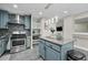 Charming kitchen with stainless steel appliances, tiled backsplash, and granite countertops at 5242 Mccarter Sta, Stone Mountain, GA 30088