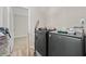Functional laundry room with a front load washer and dryer at 5242 Mccarter Sta, Stone Mountain, GA 30088