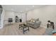 Cozy living room featuring an office space, ample seating, and modern decor at 5242 Mccarter Sta, Stone Mountain, GA 30088