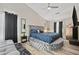 Large main bedroom featuring a plush round bed, vaulted ceiling, and modern decor at 5242 Mccarter Sta, Stone Mountain, GA 30088