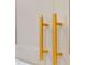 Close up of kitchen cabinetry featuring tall gold handles at 6525 Rhett Run, Cumming, GA 30028