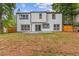 The home offers a flat backyard with patio space and a partially fenced yard at 1841 Surrey Hill Cir, Lawrenceville, GA 30044
