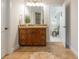 Bathroom featuring a vanity, a tile floor and a view into the next room at 1865 Mason Mill Rd, Decatur, GA 30033