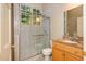 Modern bathroom features a glass-enclosed shower with marble accents and a vanity at 1865 Mason Mill Rd, Decatur, GA 30033