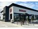 View of a modern Chipotle restaurant with outdoor seating at 1865 Mason Mill Rd, Decatur, GA 30033