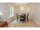 Charming breakfast nook with a chandelier, round table, and natural light at 1865 Mason Mill Rd, Decatur, GA 30033